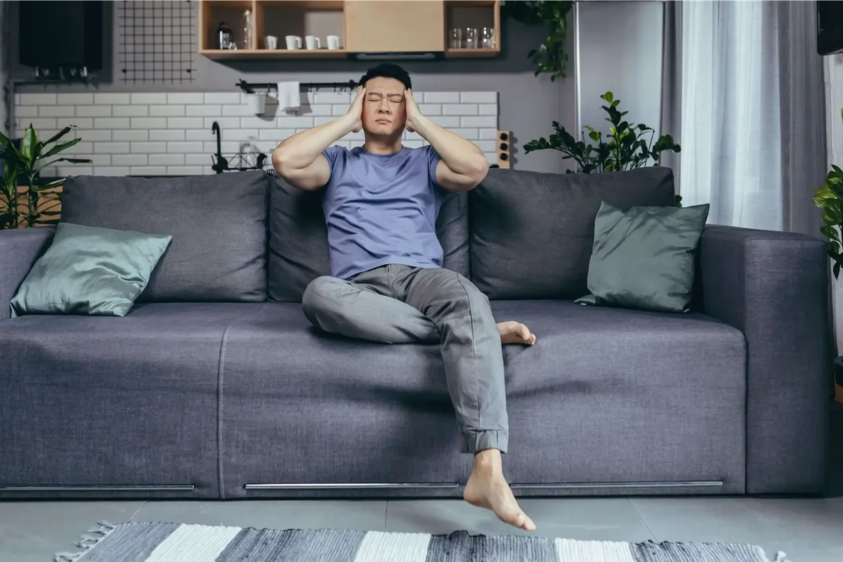 Man feeling exhausted